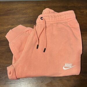 Nike Women’s Sportswear Essential Fleece Pants Peach Color